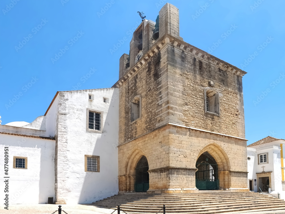 Cathedral of Faro or Se catedral de Faro with a bell tower at the Algarve coast of Portugal