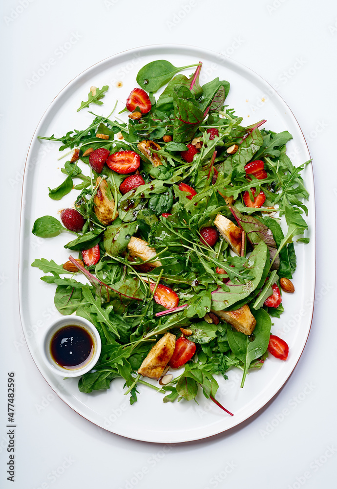 Rocket salad with grilled chicken and strawberries Rocket salad with grilled chicken and strawberries