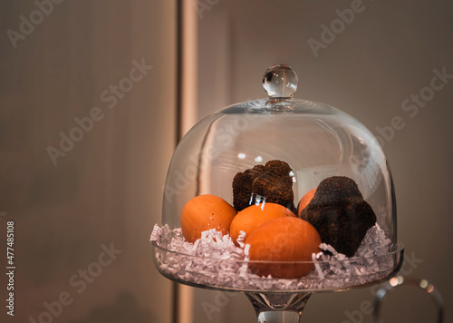 Truffles and egg in a glass urn