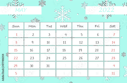 Calendar May 2022. calendar template with snowflakes. Isolated on blue background. Week starts sunday.