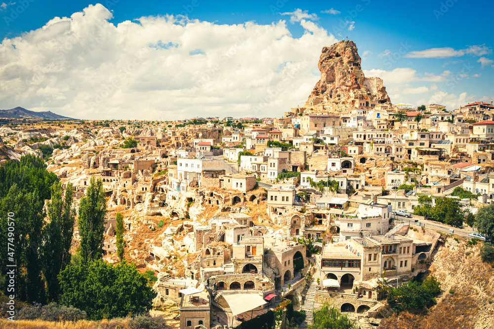 Ortahisar fortress in Cappadocia, popular tourist destination, front view with dynamic sky cloudscape static timelapse