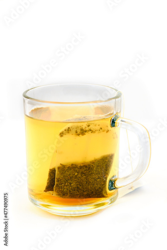 Tea in glass on white background