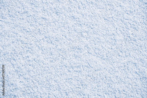 Snowy untouched surface white texture background.