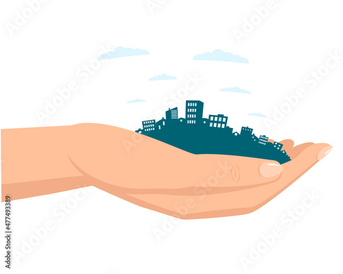 Hand holds the city in the palm of your hand.
A symbol of urban life, architecture, rent, urban planning. Vector illustration in a flat style.