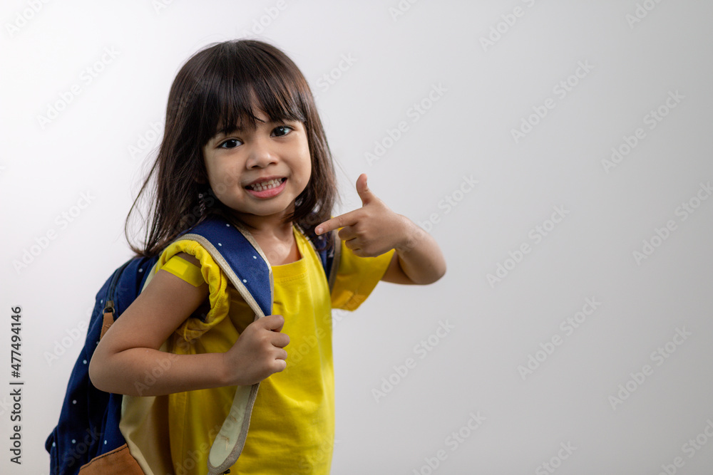 Asian young girl showing her arm with yellow bandage after got vaccinated or inoculation, child immunization, covid delta vaccine concept Asian young girl showing her arm with yellow bandage after got vaccinated or inoculation, child immunization, covid delta vaccine concept