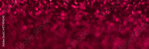 Pink sparkling glitter bokeh background, christmas texture. Holiday lights. Abstract defocused header. Wide screen wallpaper. Panoramic web banner with copy space for design