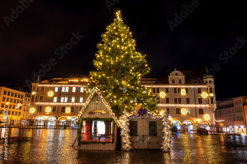 Illuminated christmas tree in Augsburg at night