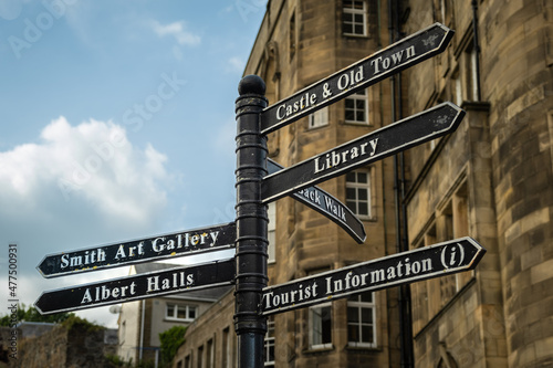 Sign post highlighting the directions to attractions in stirling town centre photo
