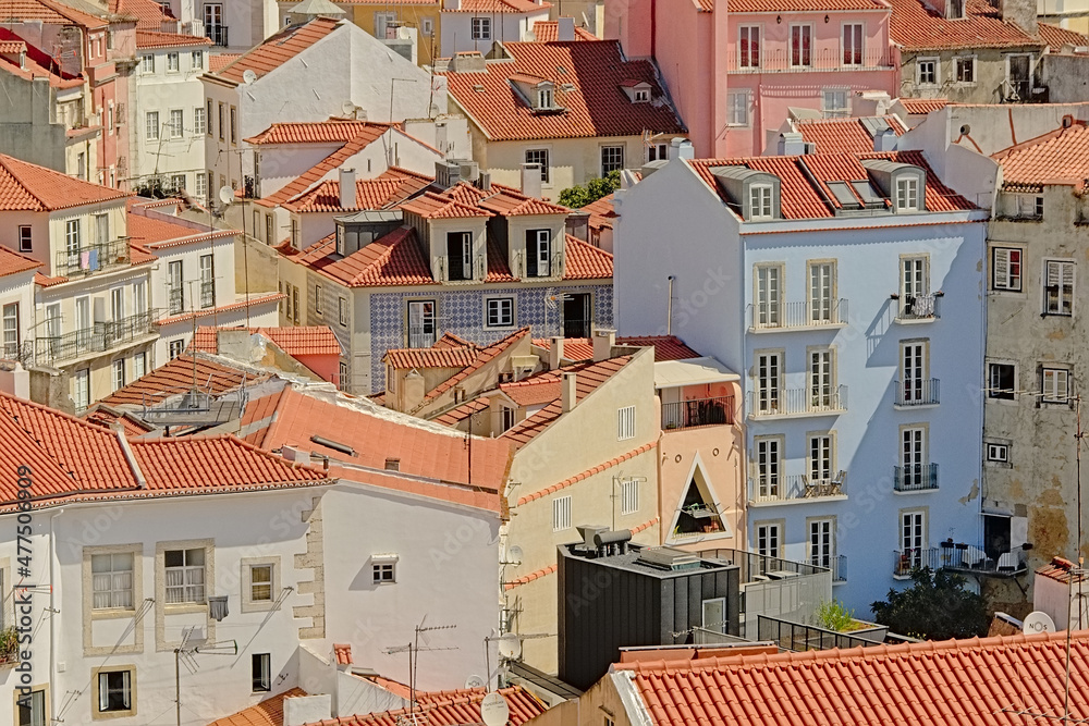 Aerial view on the pastel coloured houses and apartment buildings of the city of Lisbon, Portugal 