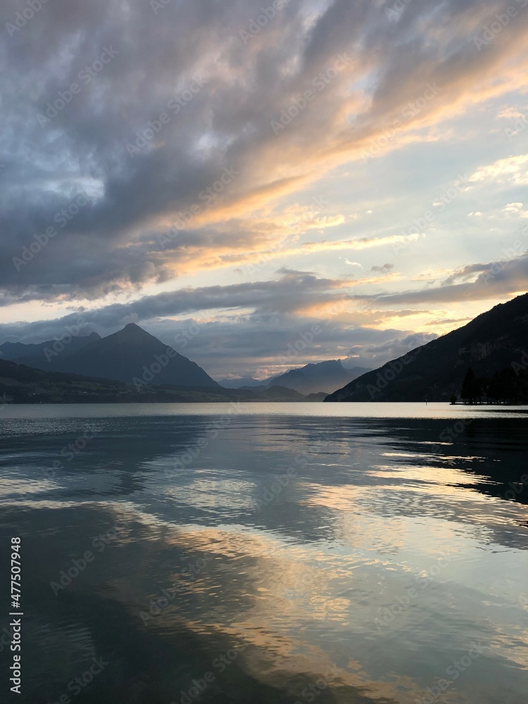 sunset over the lake in Interlaken, Switzerland sunset over the lake in Interlaken, Switzerland