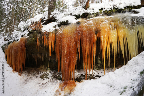 Beautiful natural icefalls with dark colours (Konirna, Brtnicke ledopady) is popular tourist attraction in Czech Republic in winter time