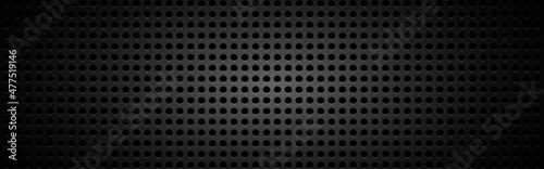 Metal mesh background. Black perforated metal. Steel backdrop with black cells. Carbon texture with light effect. Dark sheet metal. Composite material. Vector illustration