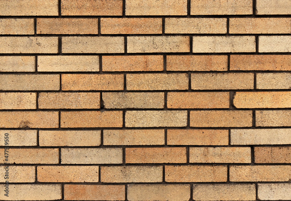 Brown brick fence. Background and texture. Brown brick fence. Background and texture.