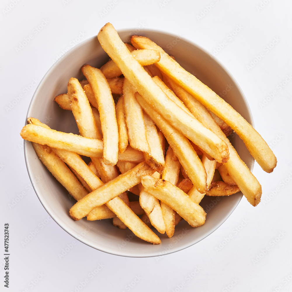 Bowl of french fried potatoes isolated over white background Bowl of french fried potatoes isolated over white background