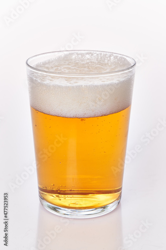  One glass of beer isolated over white background
