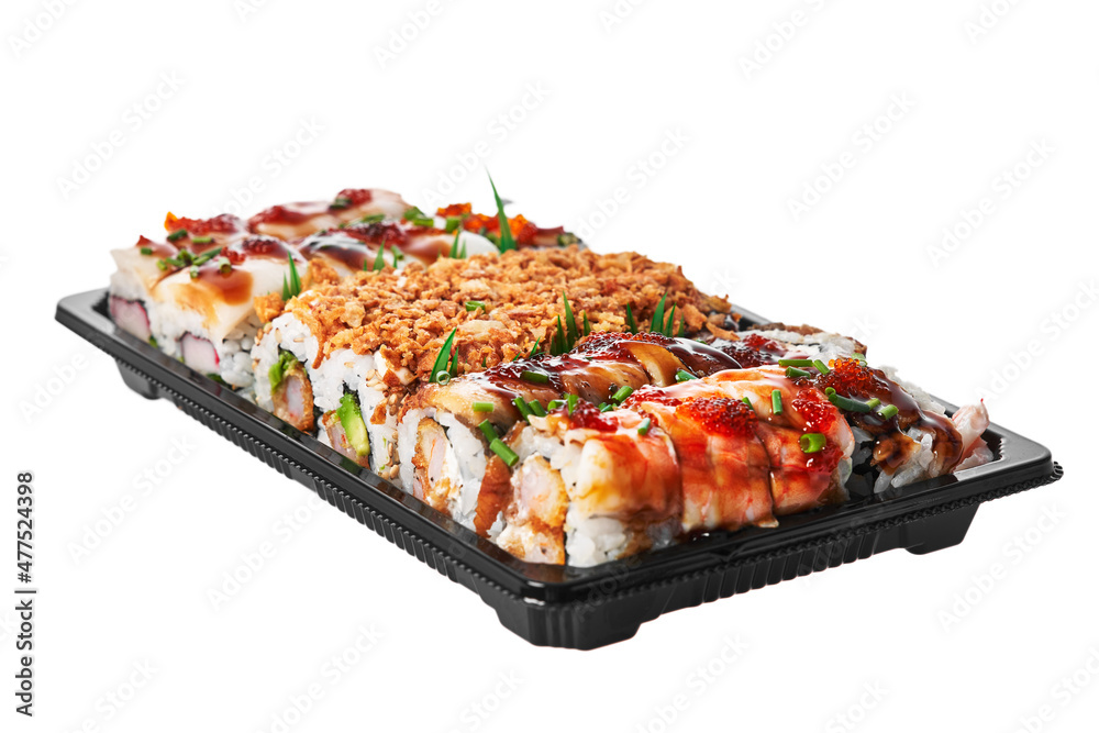 Delivery tray of uramaki sushi isolated on white background Delivery tray of uramaki sushi isolated on white background