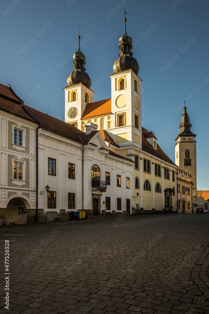 View of the city of Telc in the winter sunset.
The picturesque castle and the historic center with the decorative facades of the houses belong to the UNESCO World Heritage Site, Czech Republic.