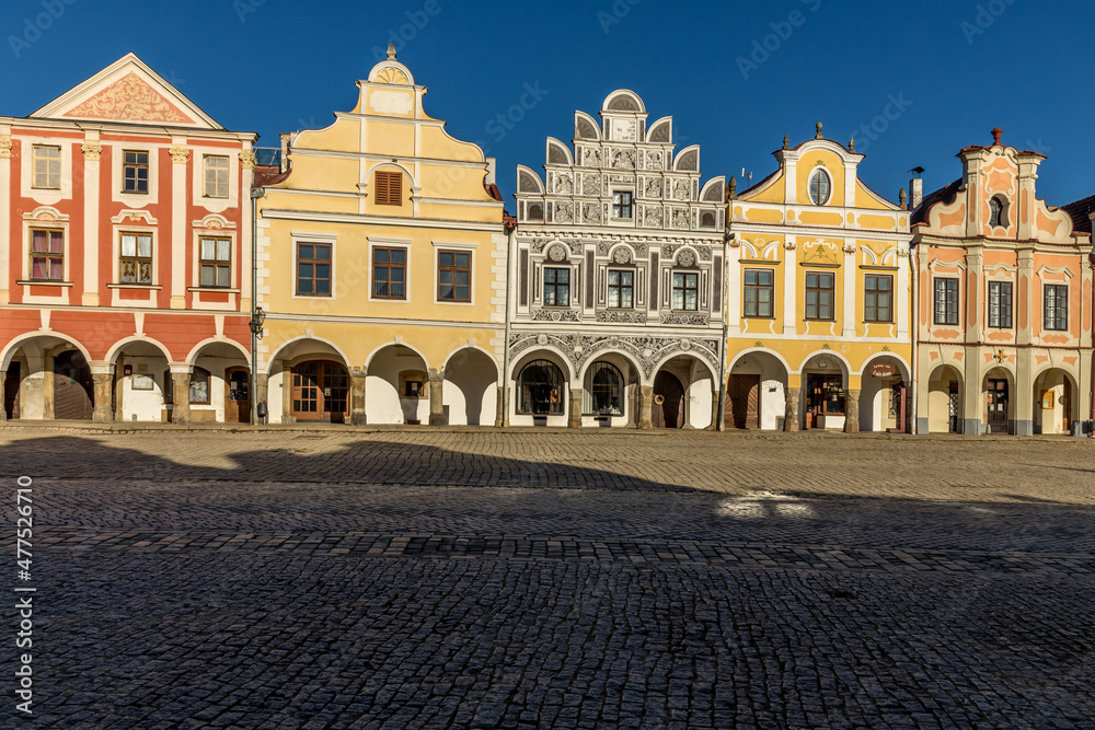 View of the city of Telc in the winter sunset.
The picturesque castle and the historic center with the decorative facades of the houses belong to the UNESCO World Heritage Site, Czech Republic.