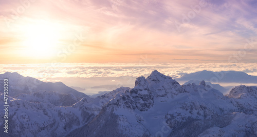 Aerial Panoramic View of Canadian Mountain covered in snow. Sunset Sky Art Render. Located near Squamish  North of Vancouver  British Columbia  Canada. Nature Background Panorama