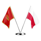 Two table flags isolated on white background 3d illustration, montenegro and poland