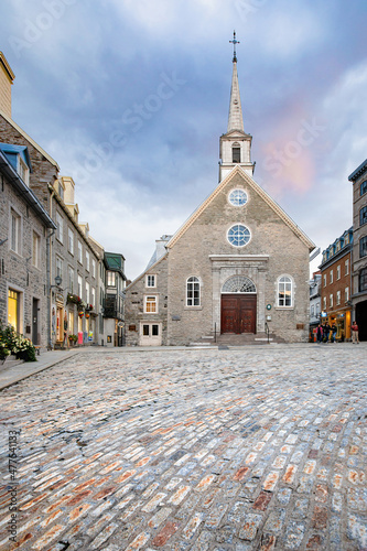 Quebec church with cobblestone streets old city charm Canada