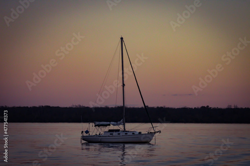 sailboat at sunset © Alex