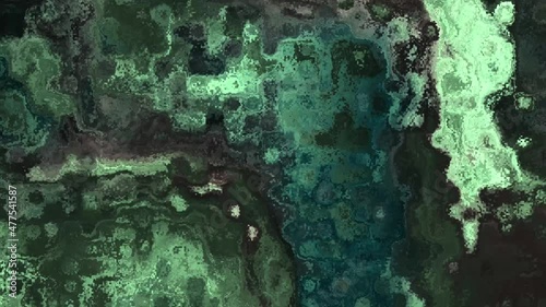 4k background video of everchanging detailed particle texture in vivid colors
