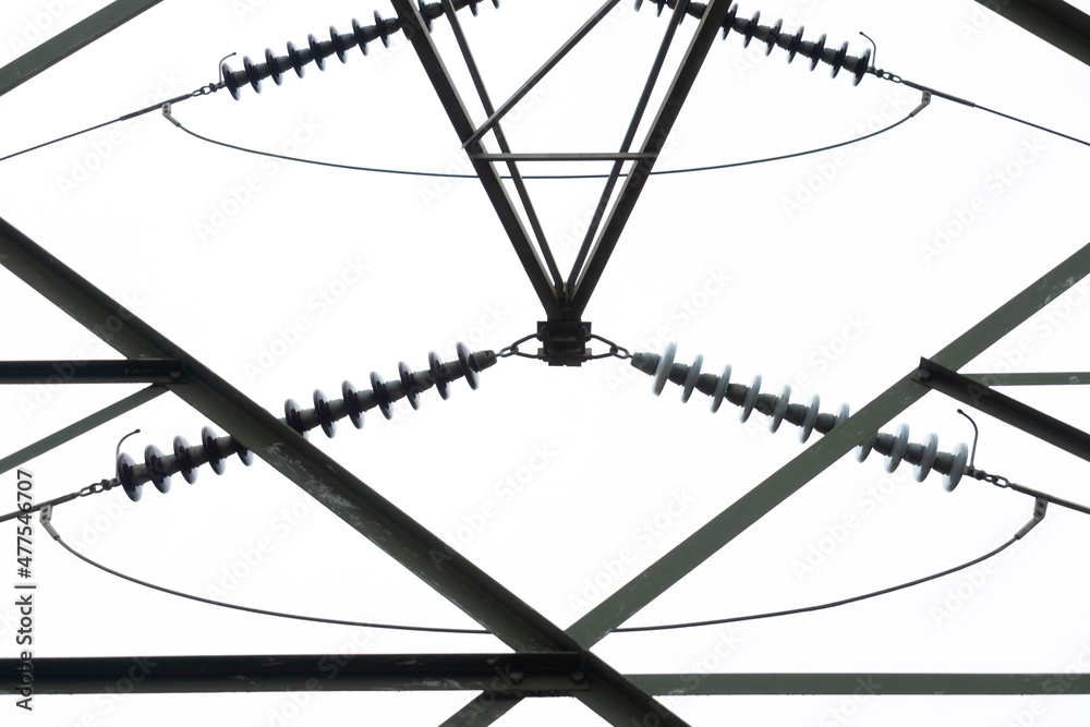 Photograph looking up internally through a large steel electrical transmission tower