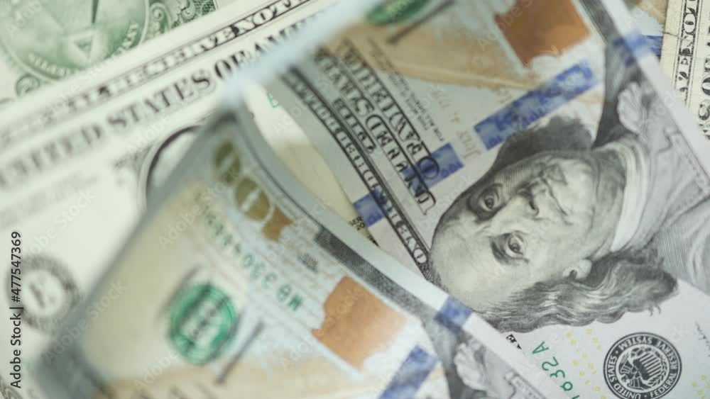 American paper money currency dollar bills falling down on each other banknotes background American paper money currency dollar bills falling down on each other banknotes background
