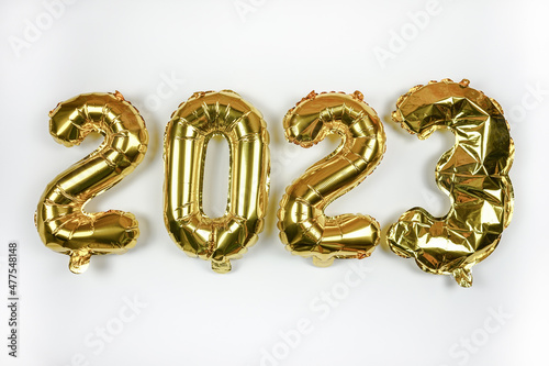 foil balloons numeral 2023. Happy new year 2023 holiday. 2023 decoration holiday on white background. 
