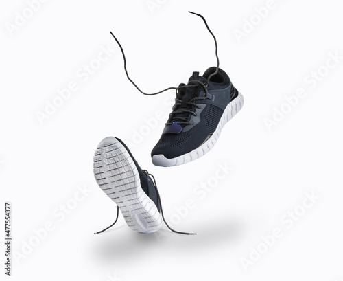 Blue Sports Shoe Drop with White Sole, on White Insulated Background