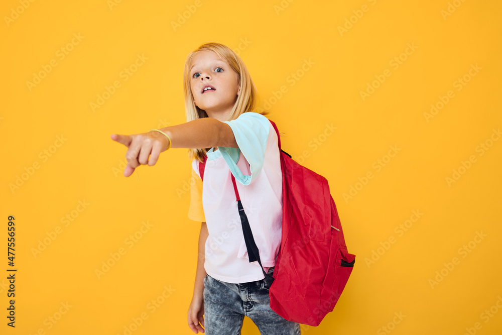 little girl blonde hair school backpack posing yellow color background little girl blonde hair school backpack posing yellow color background