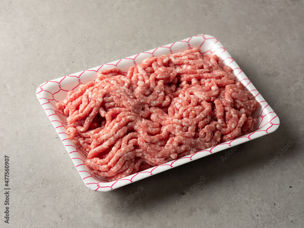 Raw minced meat on a wrapping plate Raw minced meat on a wrapping plate