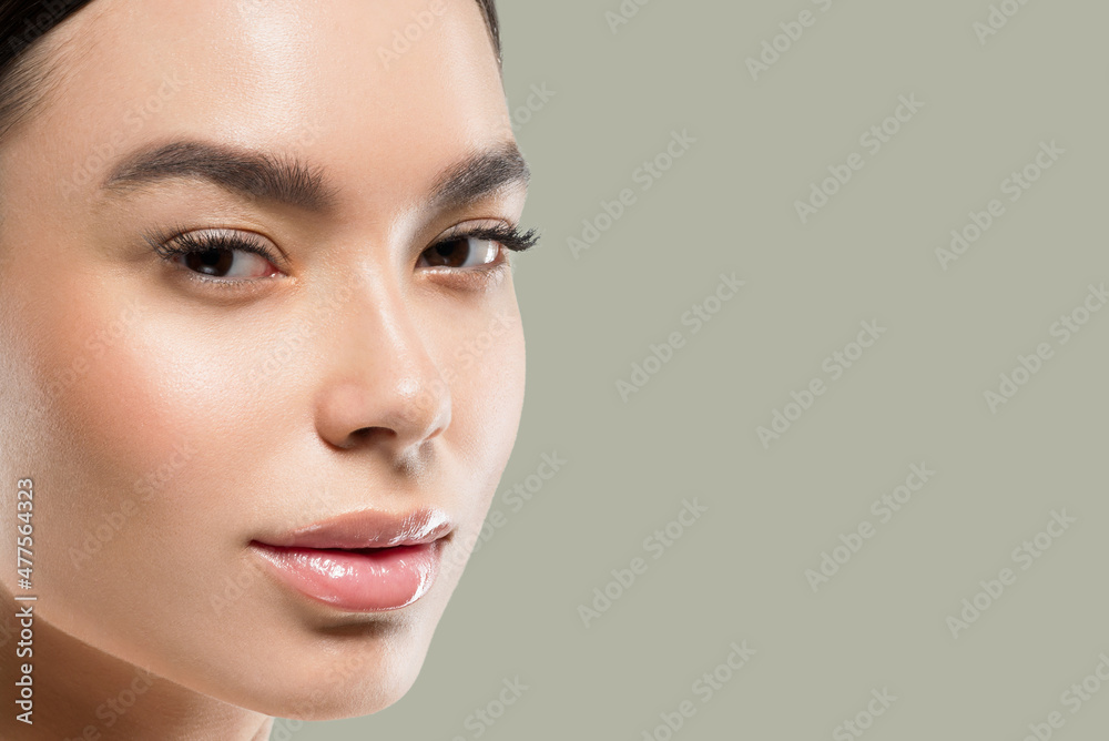 Obraz premium Asian woman beauty healthy skin care and beautiful hair female model portrait Color background green