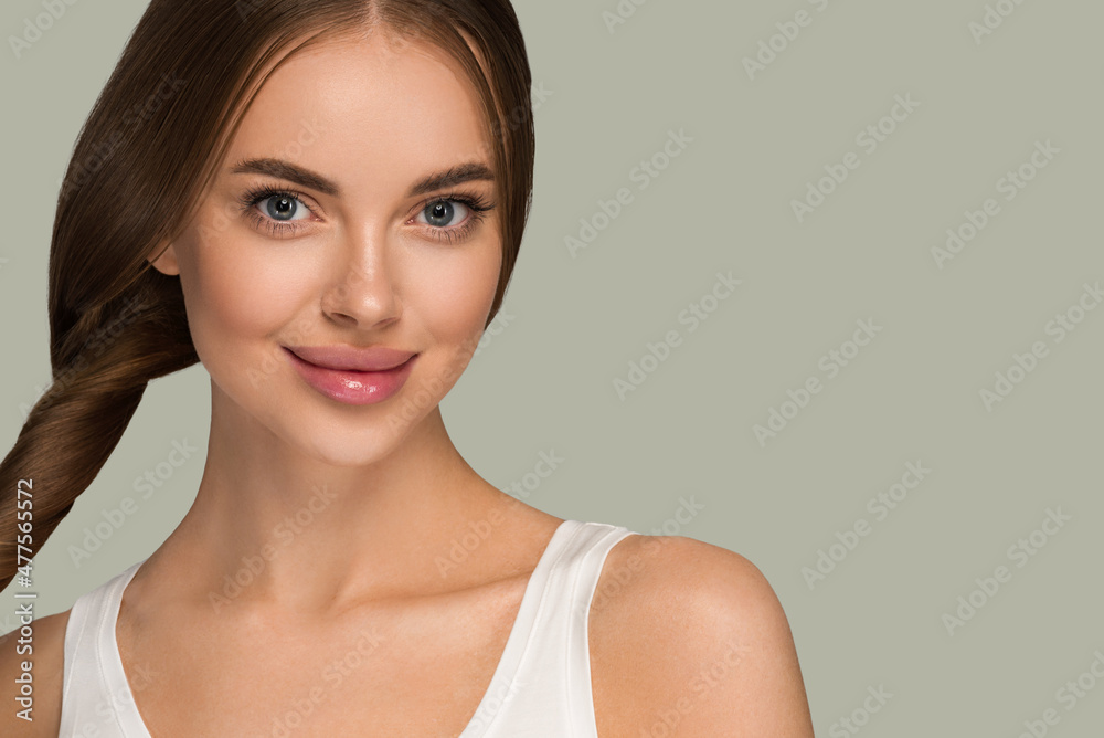 Beautiful woman with long smooth healthy hair tail beauty casual style. Color background green Beautiful woman with long smooth healthy hair tail beauty casual style. Color background green