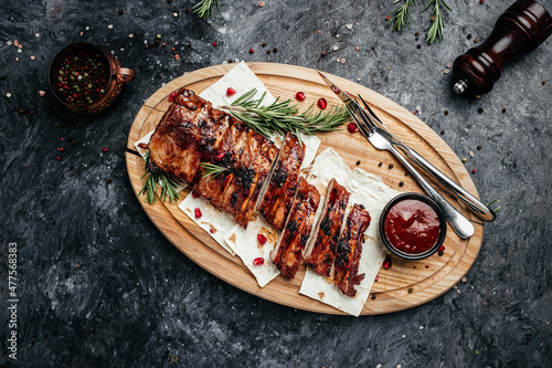 Spicy hot grilled spare ribs, Barbecue Pork Spare Ribs with BBQ sauce, banner, menu, recipe place for text, top view.