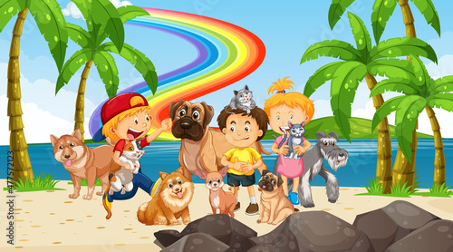 Beach scene with children playing with their dogs