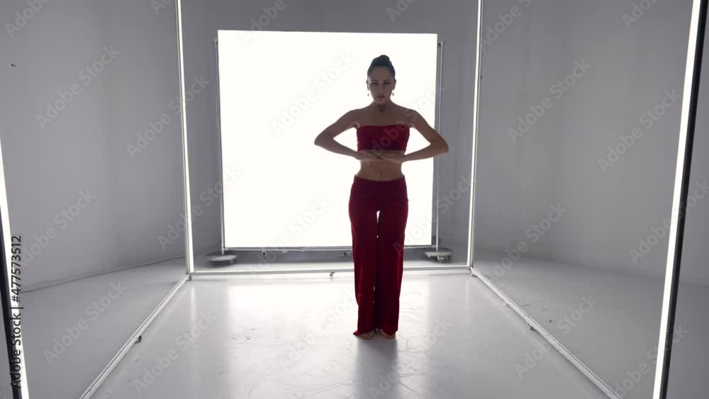 female dancer is dancing in modern decoration, minimalistic style, original dance performance female dancer is dancing in modern decoration, minimalistic style, original dance performance