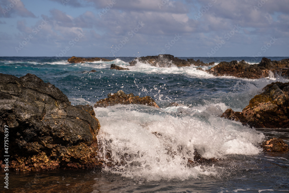 Rocky sea coast. Beautiful turquoise waters of the Sea. Ocean waves against the coastal rocks. Scenery view on ocean. Wonderful summer seascape. Rocky sea coast. Beautiful turquoise waters of the Sea. Ocean waves against the coastal rocks. Scenery view on ocean. Wonderful summer seascape.