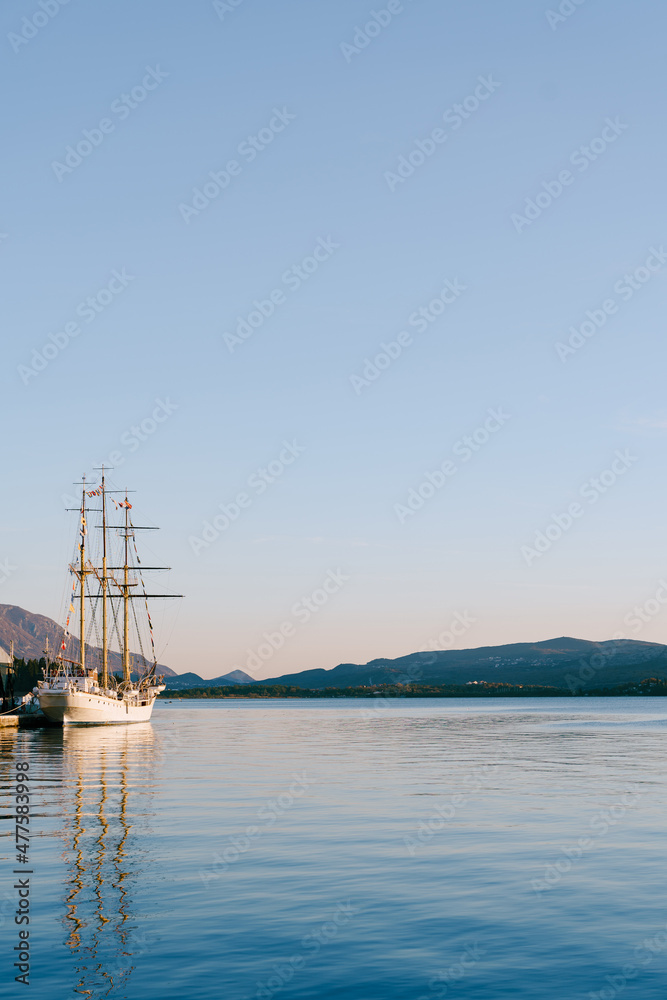 Embankment with sailing ship in the town of Tivat. Montenegro