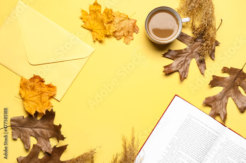 Cup of tasty coffee, book, ...