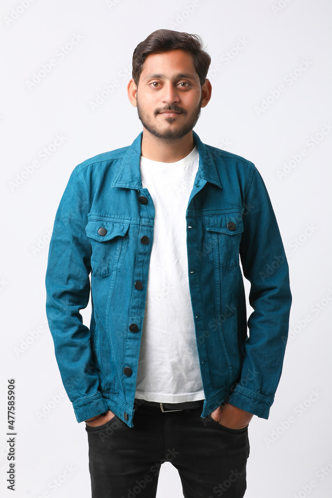 Young indian man giving expression on white background. Young indian man giving expression on white background.