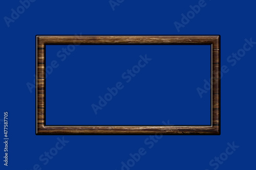 Bilderrahmen aus Holz vor blauem Hintergrund