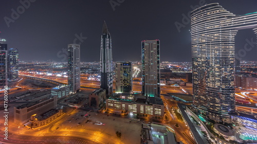 Sky view to skyscrapers and hotels in Dubai downtown aerial timelapse.
