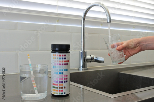 Drinking water test kit on home kitchen counter photo