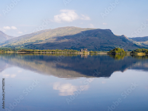 View over Loch Awe to Innes Chonnel Castle and reflection in the background, Loch Awe, Scotland, UK photo