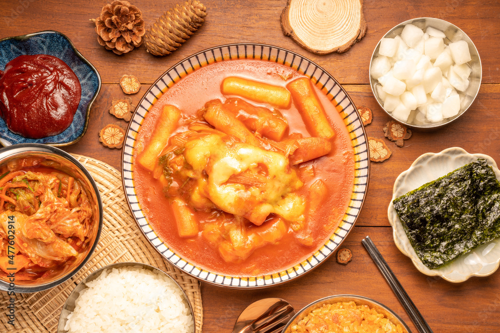 Spicy Rice Cake with Cheese or Teokbokki with spicy sauce Korean traditional food, Tteokbokki is Korean rice cake stick in spicy sauce Korean cuisine dish. Spicy Rice Cake with Cheese or Teokbokki with spicy sauce Korean traditional food, Tteokbokki is Korean rice cake stick in spicy sauce Korean cuisine dish.