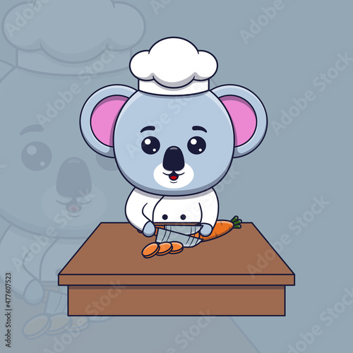 Canvas Print Cute koala chef cutting carrot