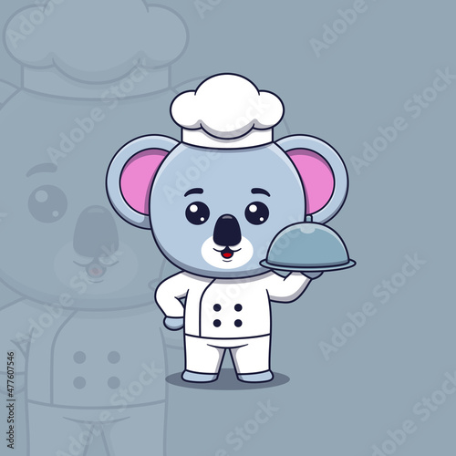 Cute koala chef holding restaurant cloche