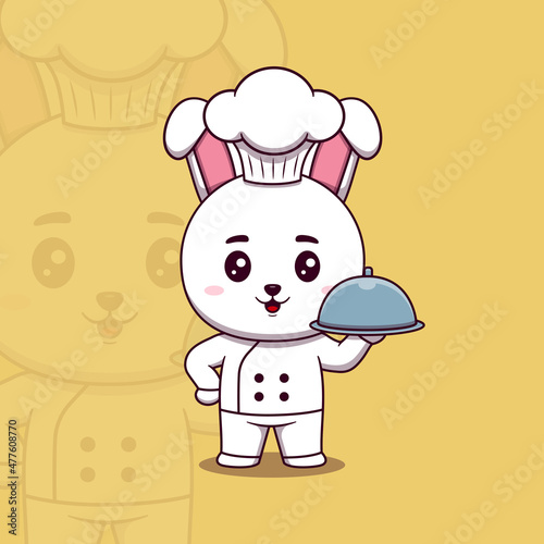 Cute rabbit chef holding restaurant cloche